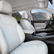 A photo of the white leather seats in a Kia Sorento SUV.